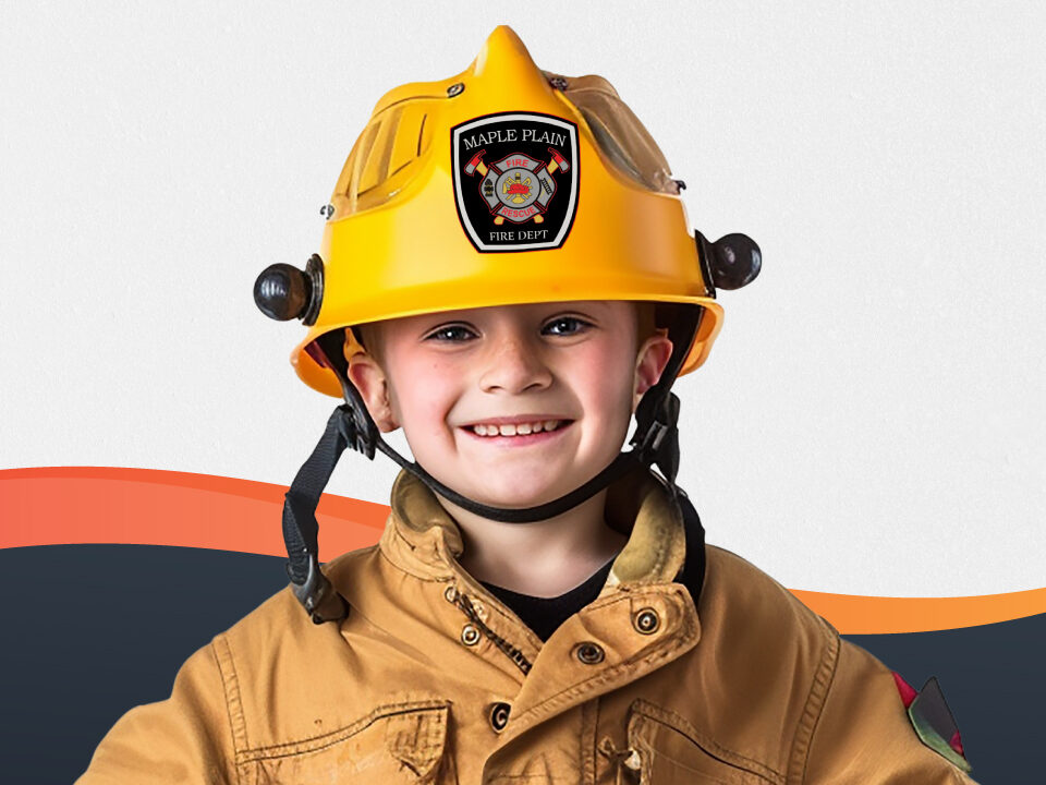 Boy in firefighter uniform